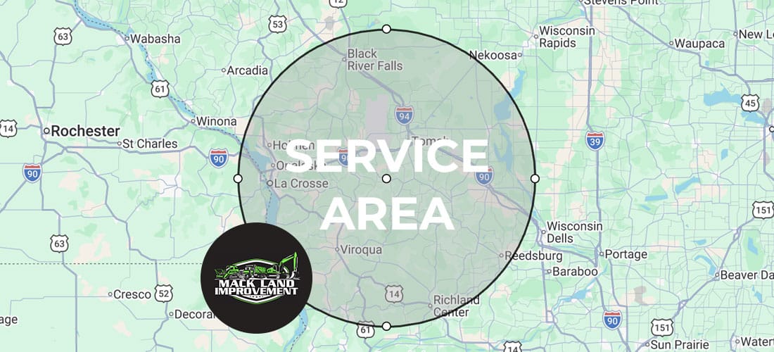A map highlighting a circular service area around Tomah, Wisconsin, covering nearby cities like La Crosse, Holmen, and Black River Falls. “Service Area” is labeled in the center. The Mack Land Improvement logo is in the lower left corner.